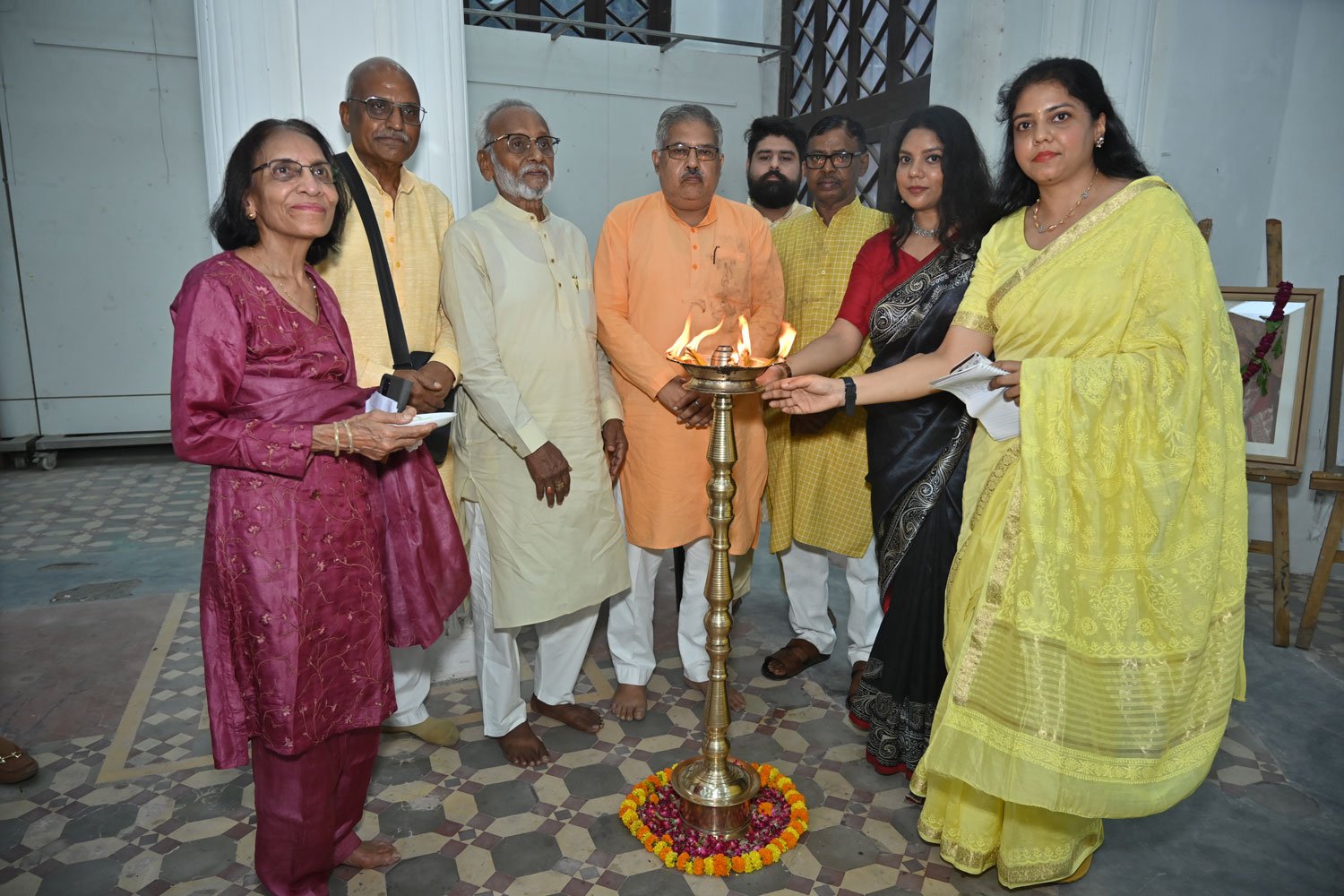 Traditional lamp-lighting ceremony marking the inauguration of the Sukhvir Sanghal Digital Archive.